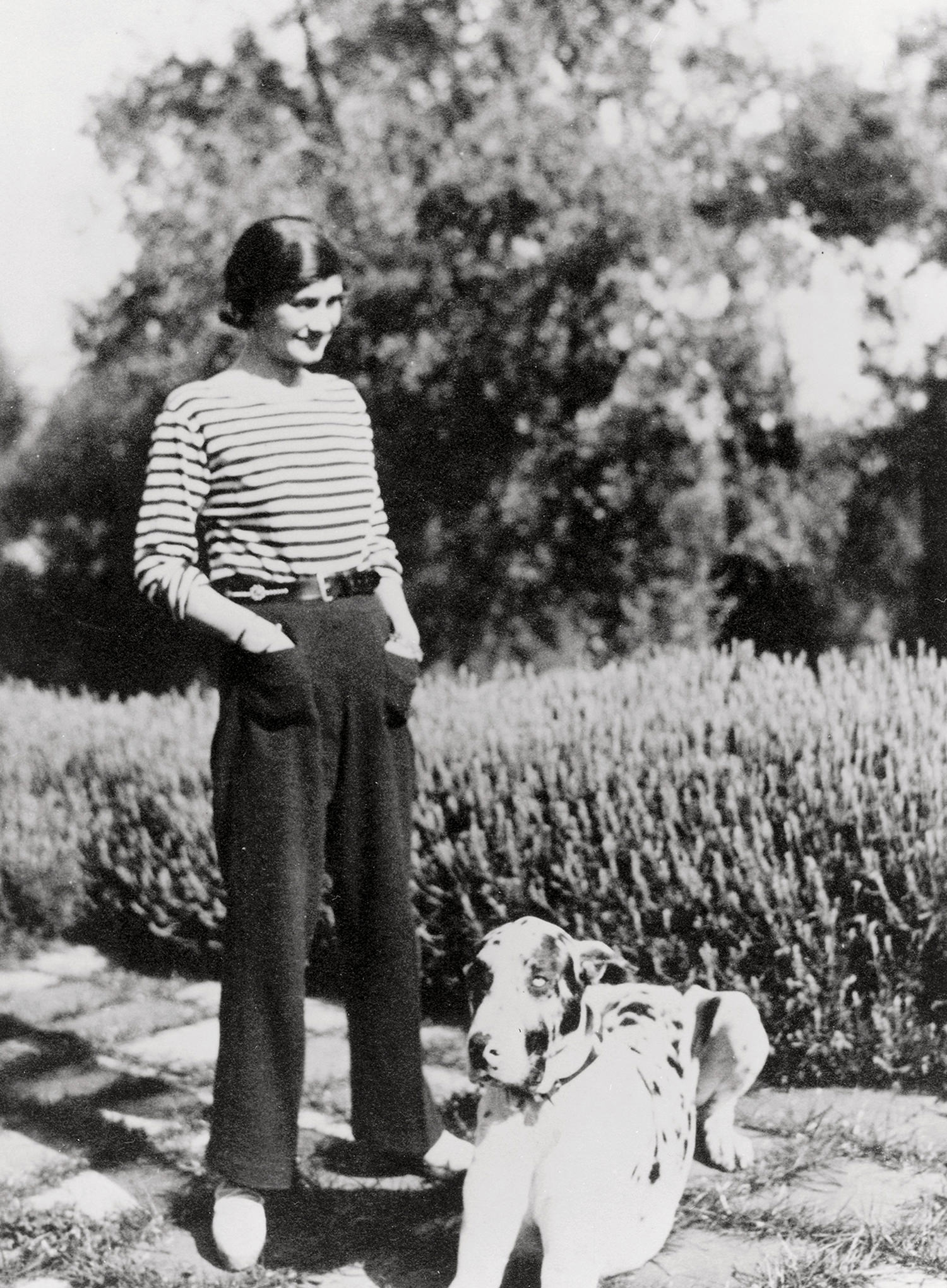 Mademoiselle Chanel at her house La Pausa in the French riviera with her dog Gigot