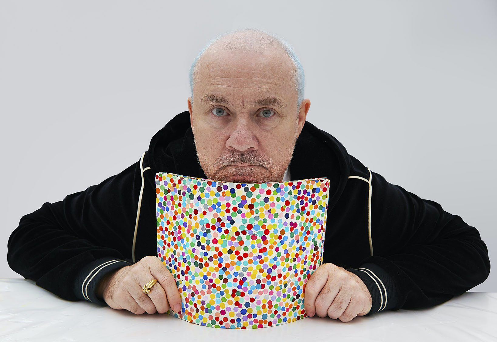 Damien Hirst with The Currency artworks, 2021.