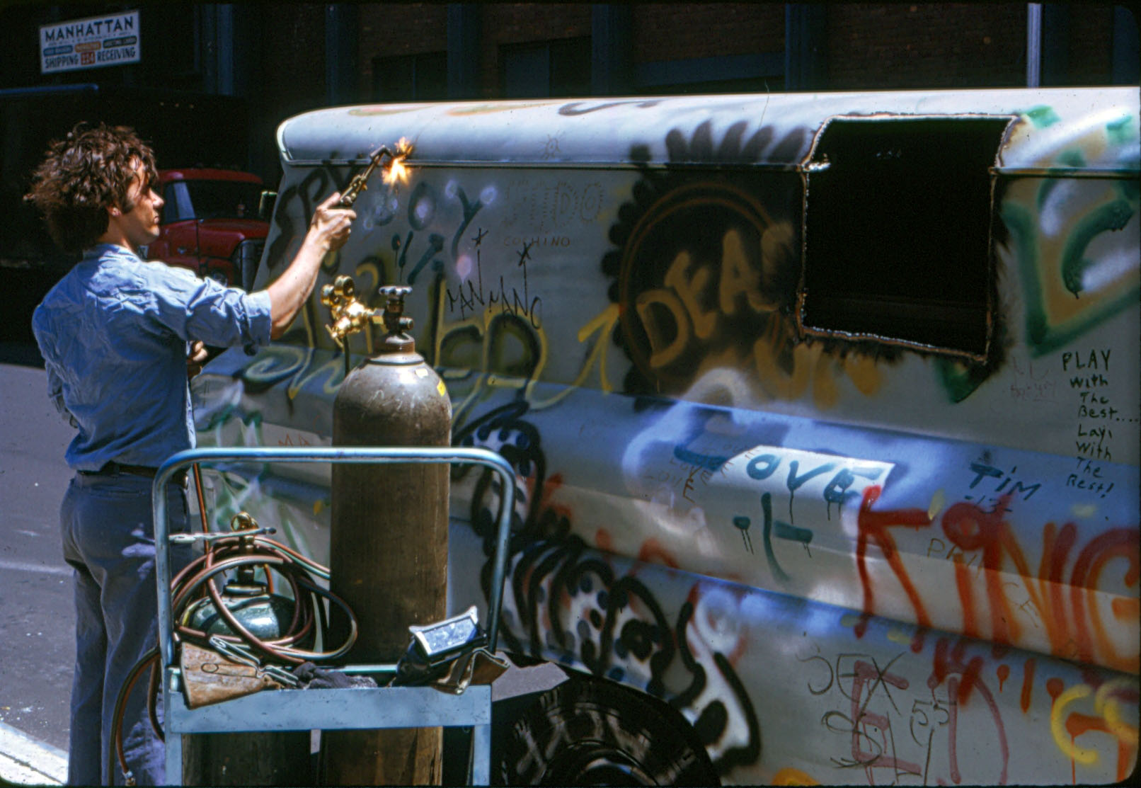 Gordon Matta Clark. Gordon Matta-Clark cutting Graffiti Truck at “Alternatives” to Washington Square Art Show, June 1973. © The Estate of Gordon Matta-Clark/Artists Rights Society (ARS), New York. Courtesy of The Estate of Gordon Matta-Clark and David Zwirner.