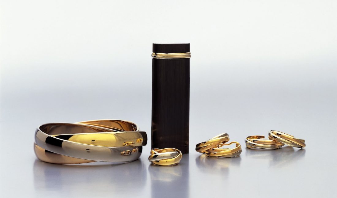 Trinity collection: bracelet, earrings and three-band rings, three-band lighter, 1982,